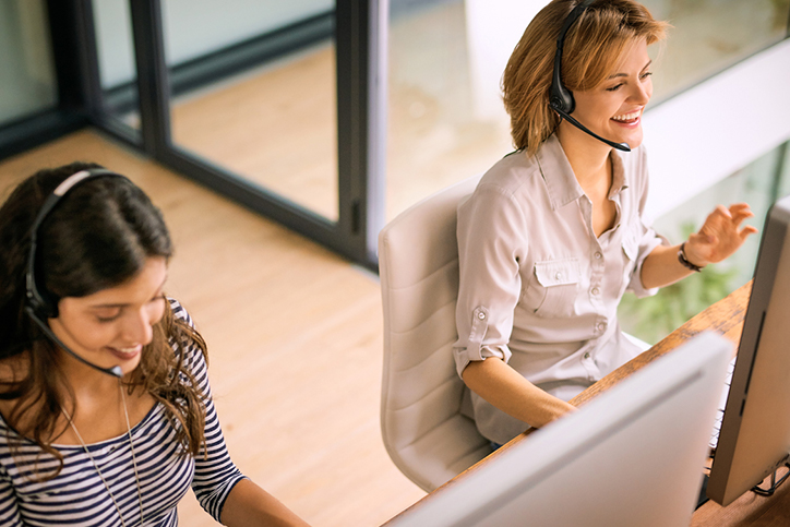 Two agents on computers