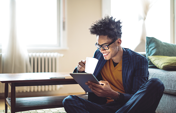 Customer smiling at the tablet